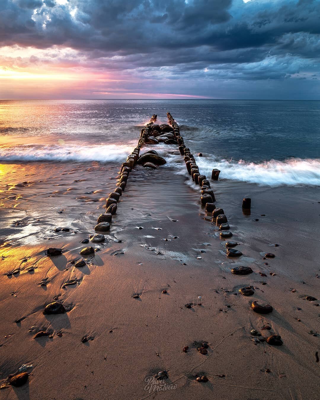 Коса в море