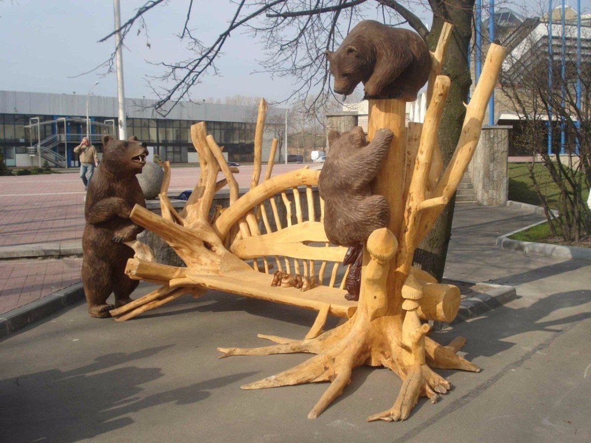 Фигуры животных из дерева для сада