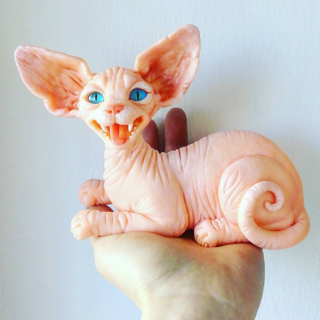 Кошка из глины