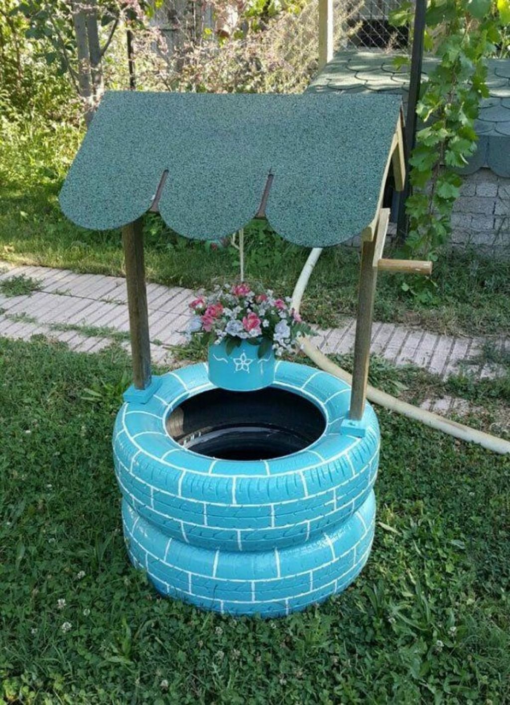 Колодец из шин для сада