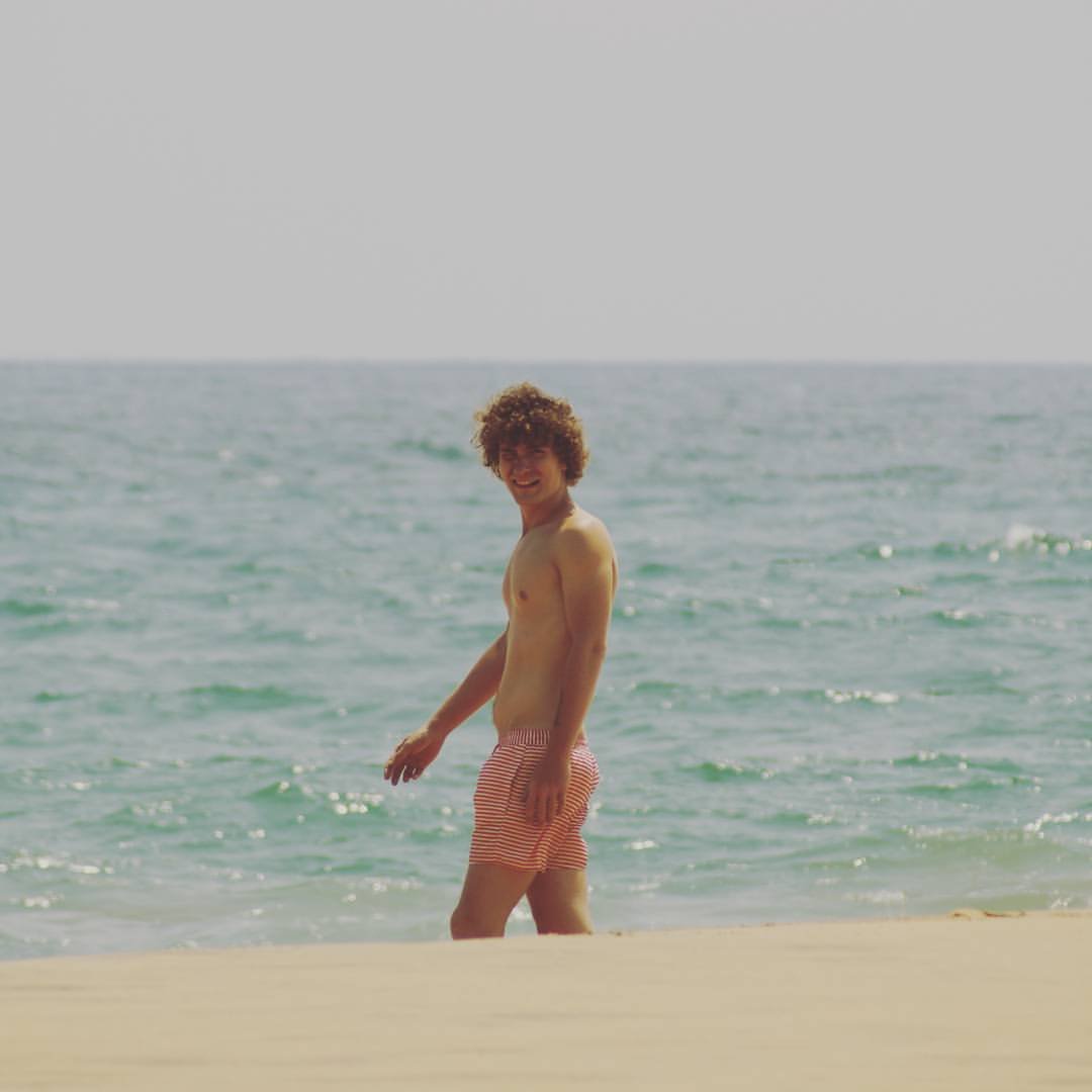 Boy on a Pebble Beach