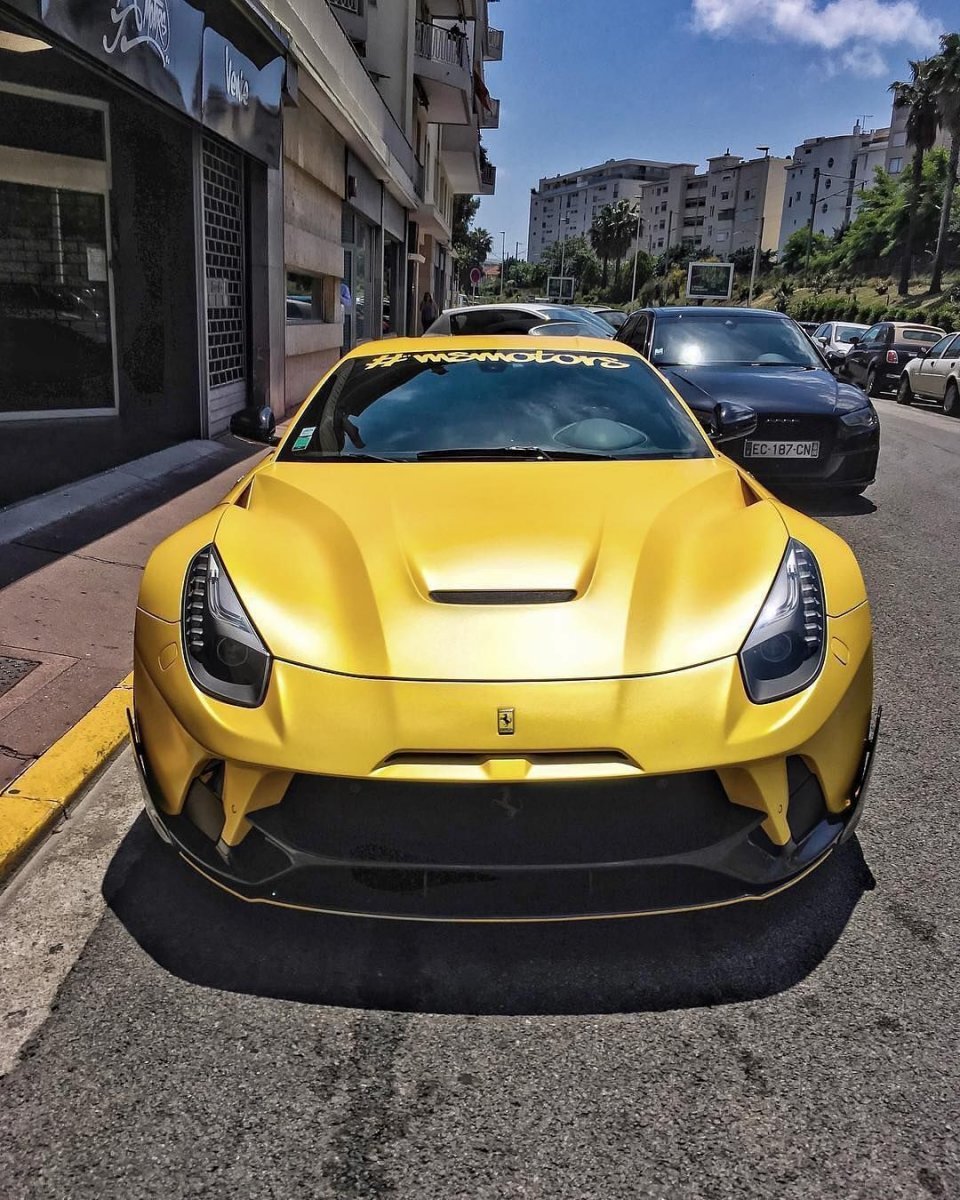 Yellow Ferrari f12 HD