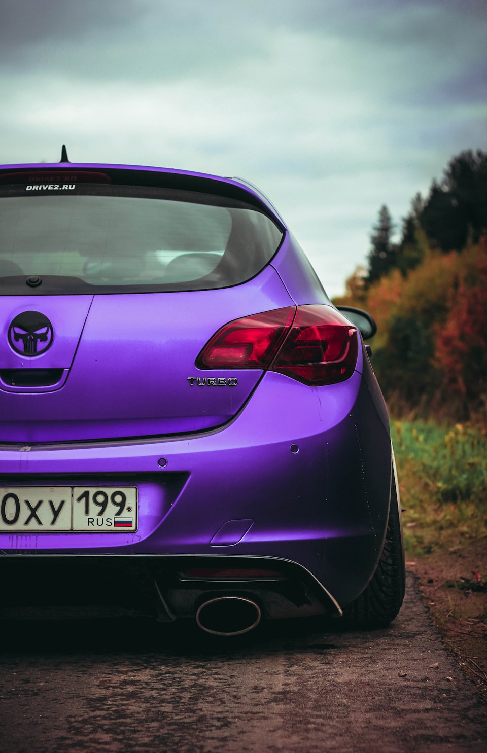 Opel Astra j GTC фиолетовая