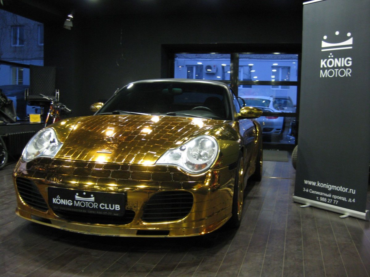 Порше 911 золотой