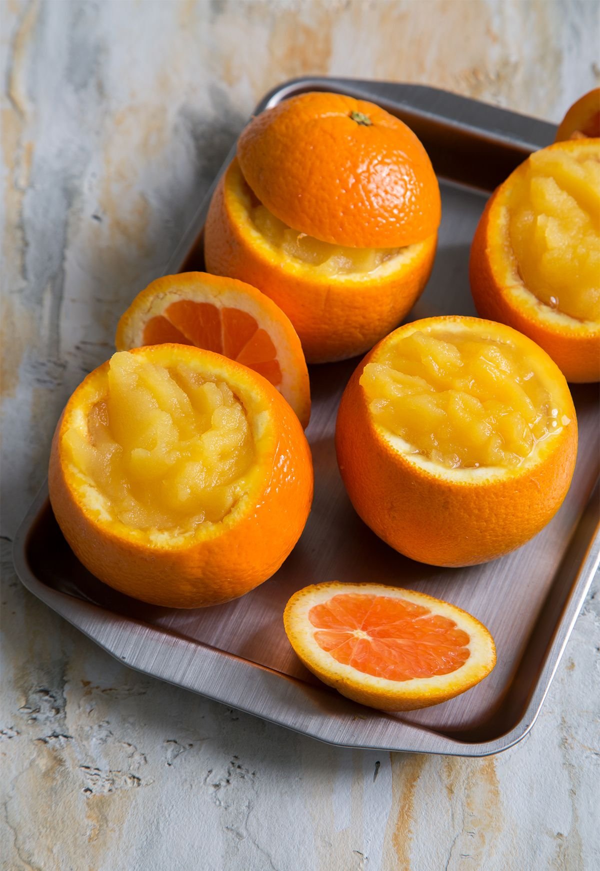 Печеные апельсины. Апельсиновый сорбет. Сорбет Абхазия мандариновый. Десерт в апельсиновой кожуре. Желе в апельсиновых корках.