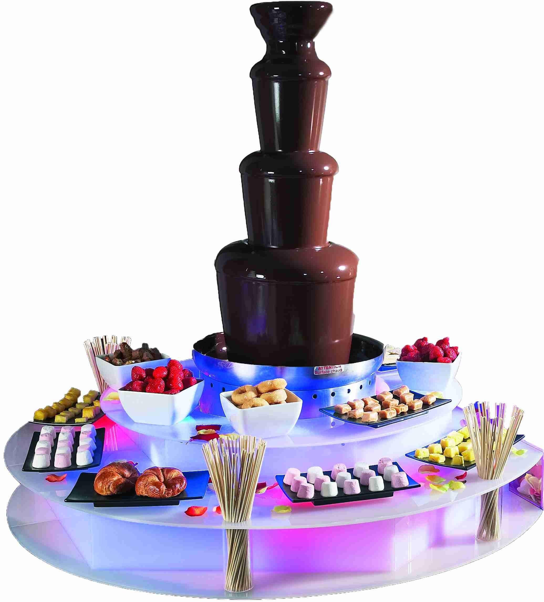 Купить шоколад для шоколадного фонтана. Шоколадный фонтан Микки Маус. Шоколадный фондан. Шоколадный фонтан с фруктами. Домашний шоколадный фонтан.