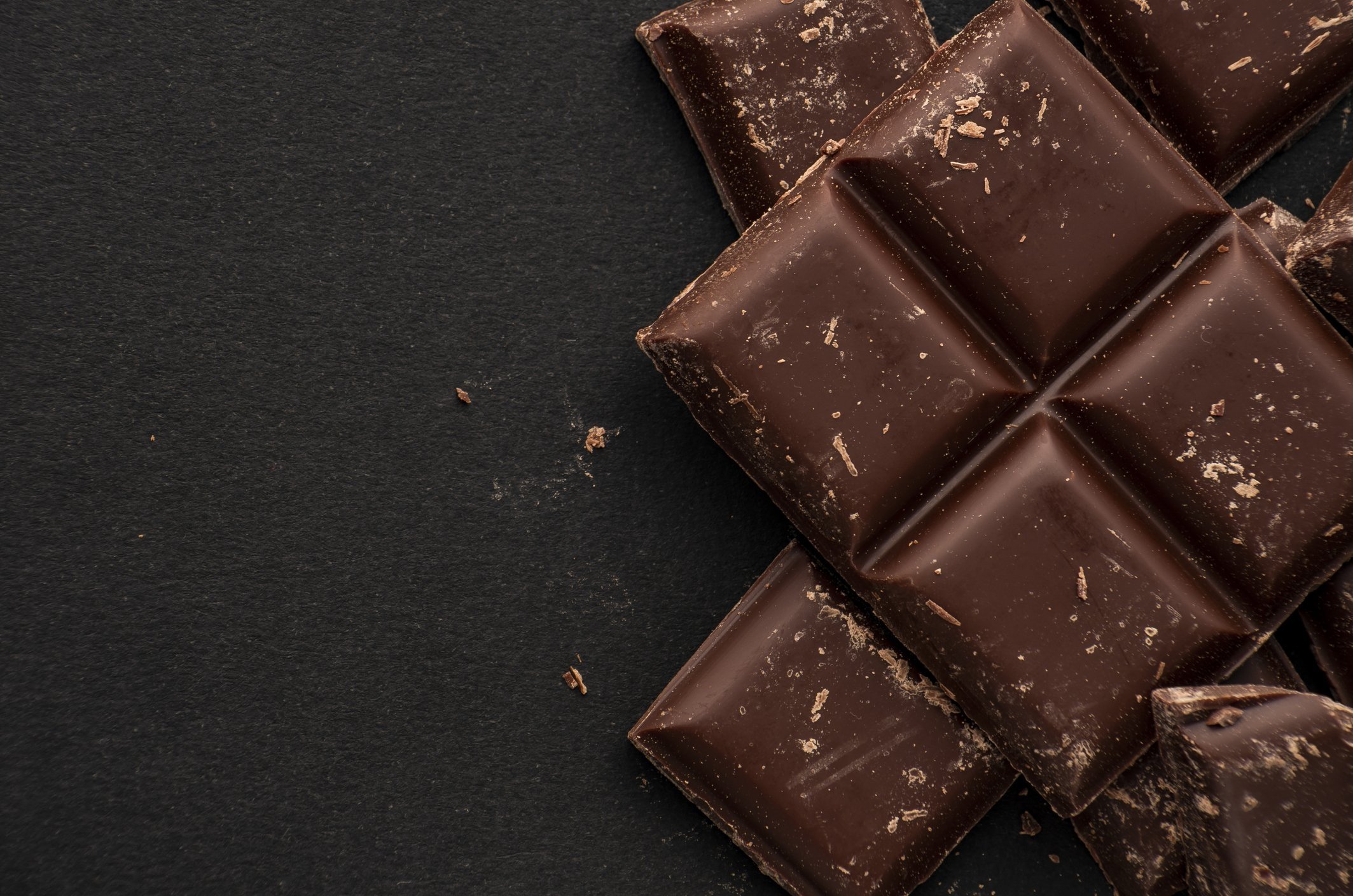 Choco black. 3. «Dark Chocolate», темный шоколад Швейцария. Плитка шоколада. Шоколадный фон. Красивые шоколадки.