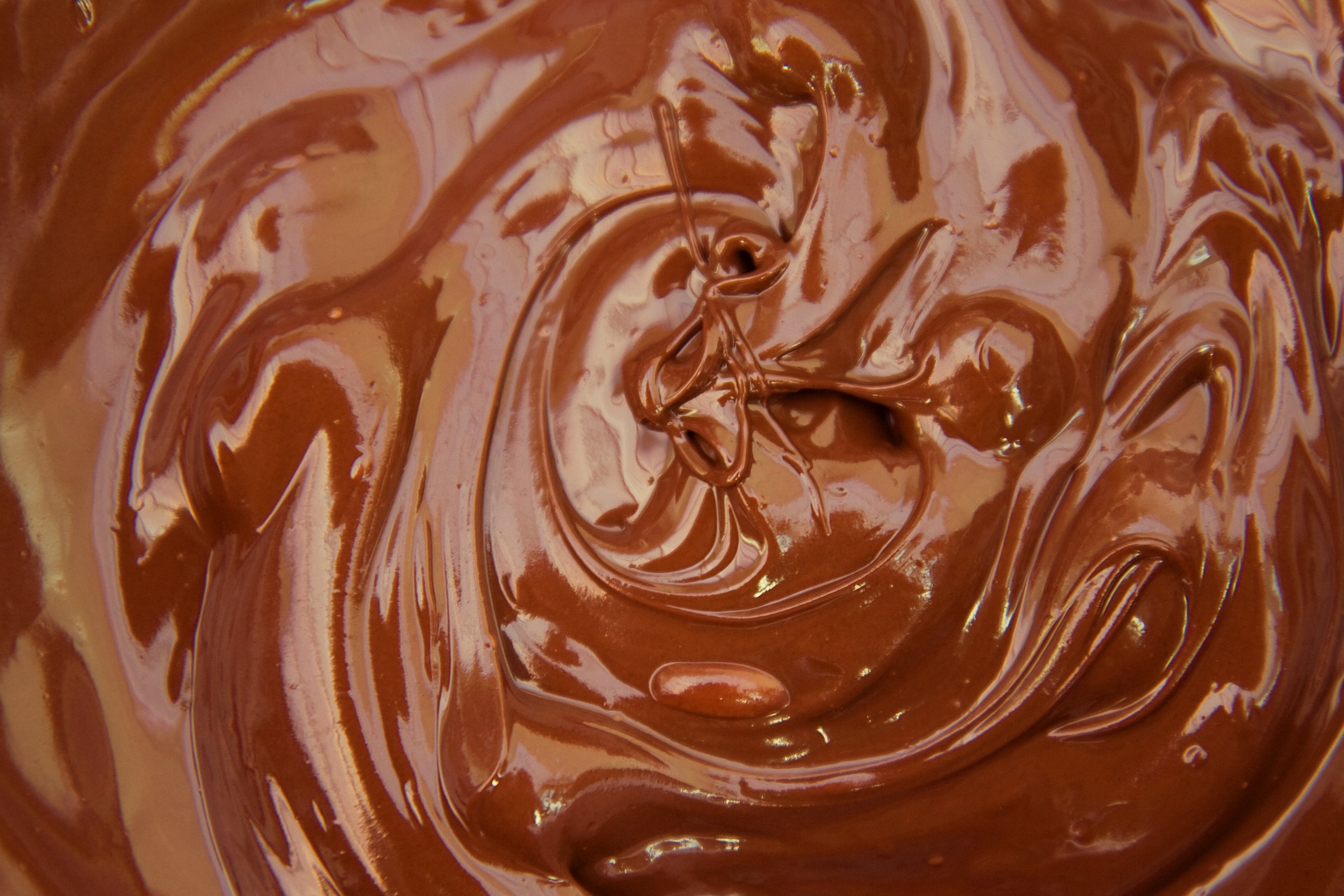 Шоколадный крем молоко какао. Шоколадный фон. Расплавленный шоколад. Шоколадный крем. Шоколад фон.