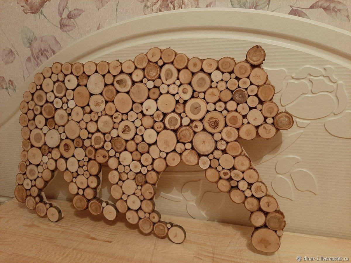 Фигурки из бревна для сада