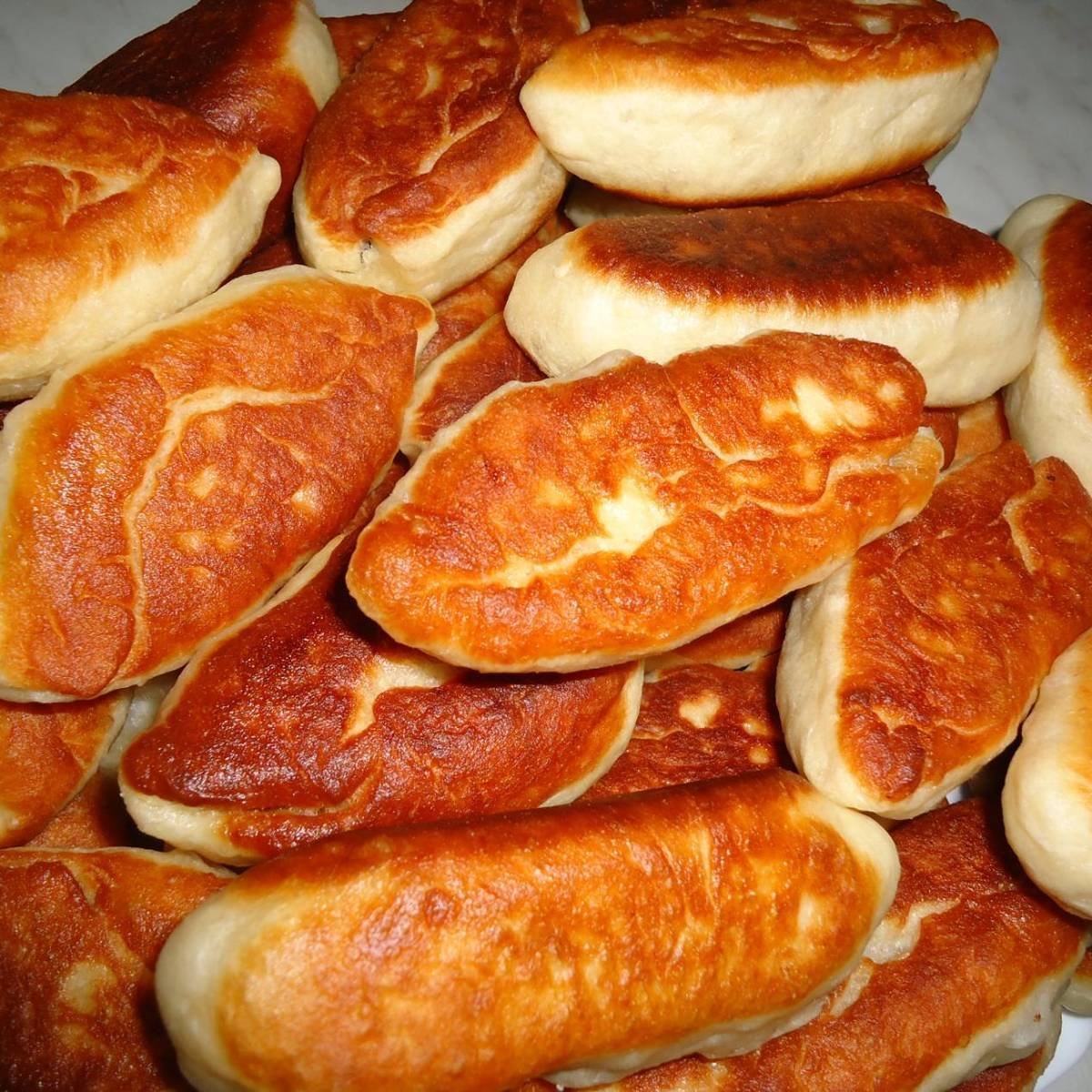Пирожки тонкие жареные