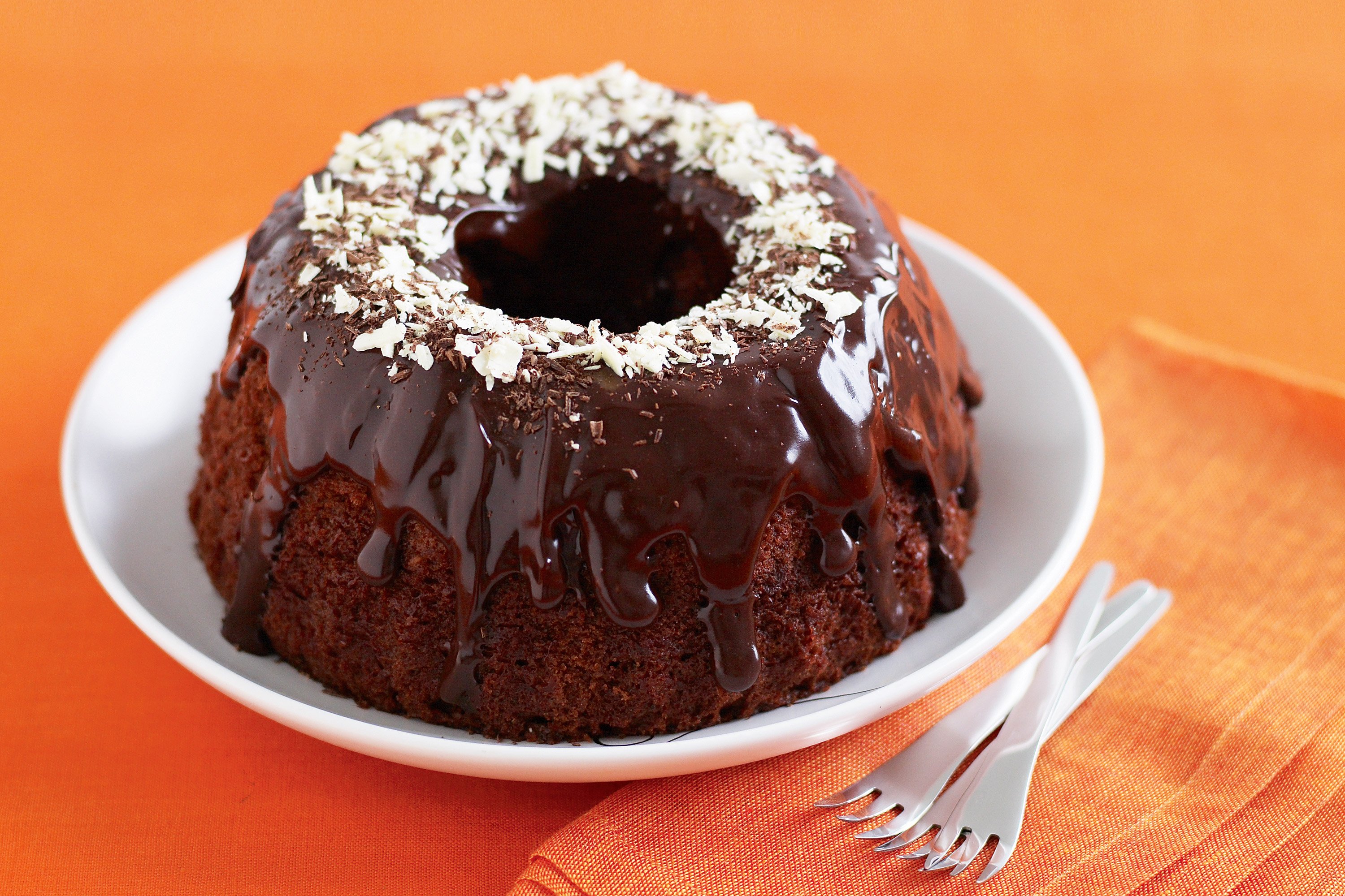 Турецкий шоколадный пирог. Торт шоколадный фондан. Шоколадный кекс. Шоколадное пирожное с кокосовой стружкой. Кекс с шоколадной глазурью.