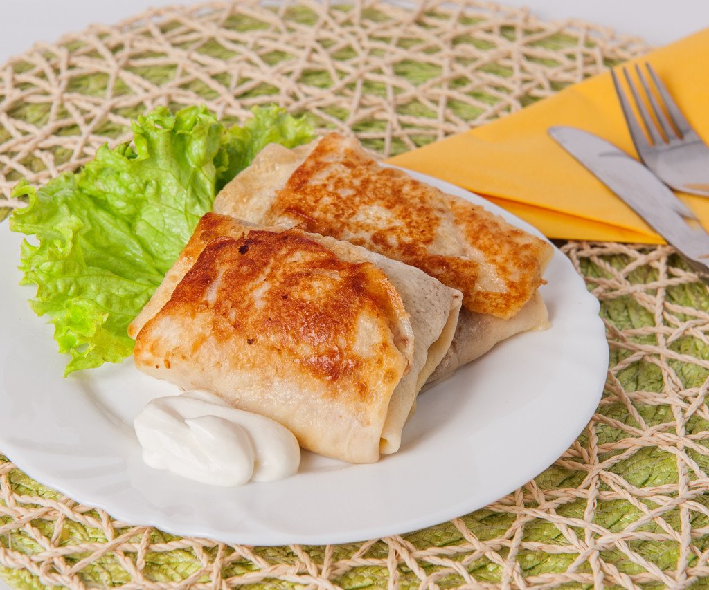 Блины фаршированные мясом и рисом