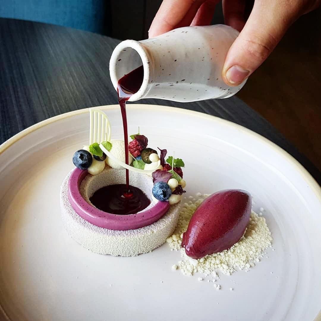Girl serve porridge