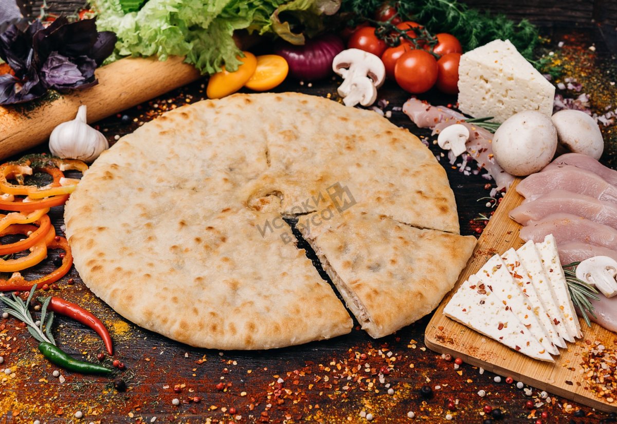 Осетинский пирог с курицей и грибами и сыром