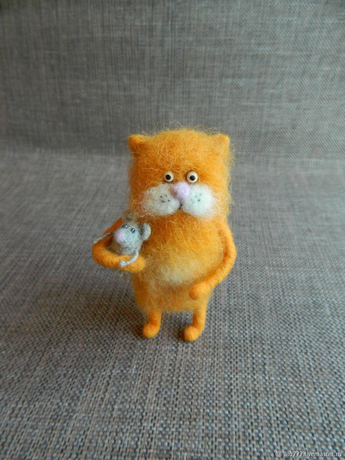 Резиновая игрушка кот рыжий