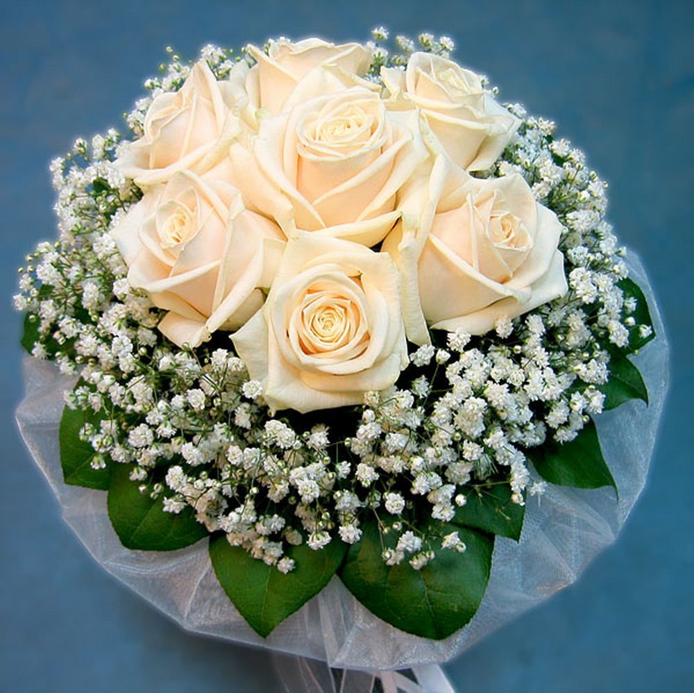 Свадебный букет из семи роз