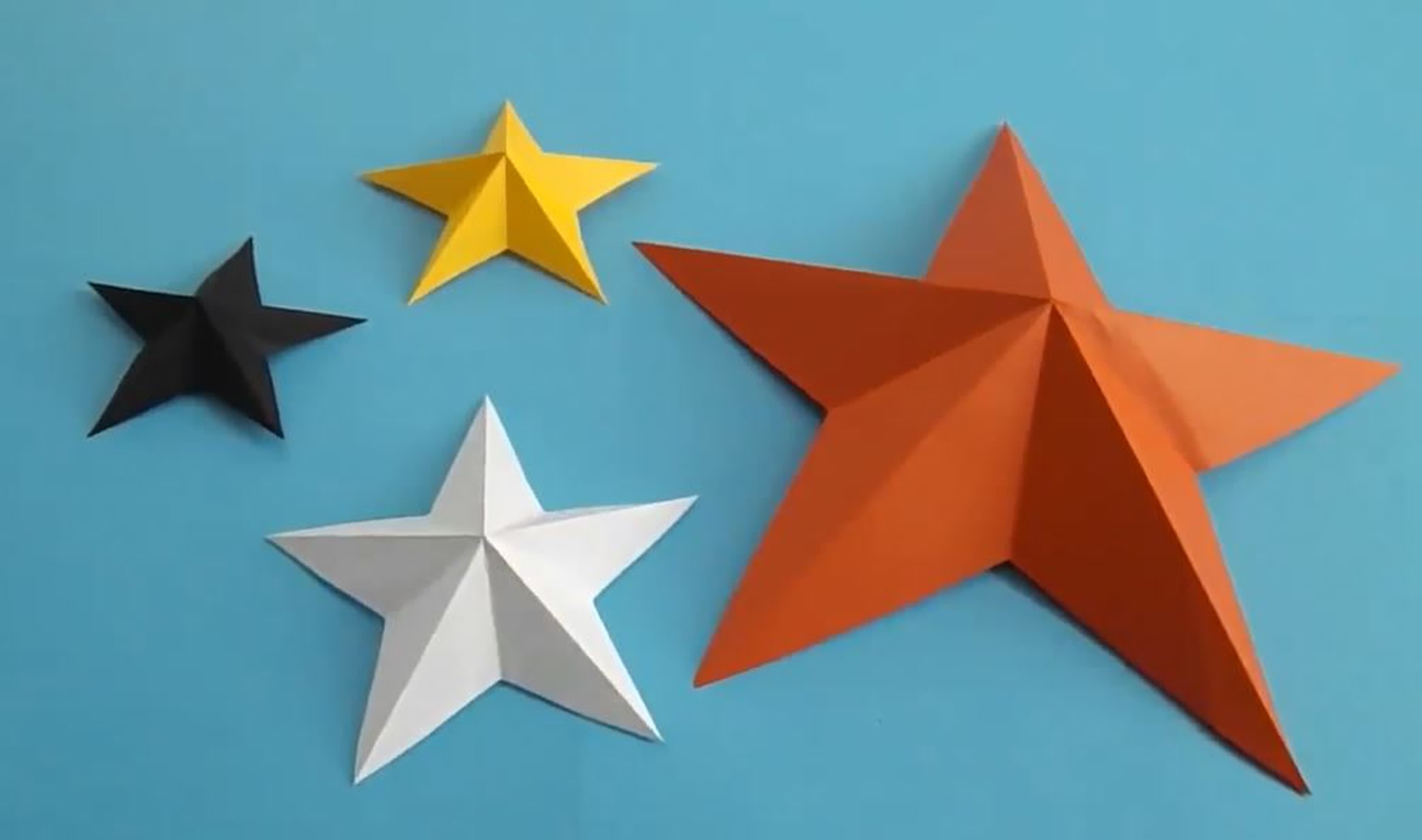 Как сделать звезду на 9. Звезда из бумаги. Оригами звезда. Объемная звезда из бумаги. Поделка объемная звезда.
