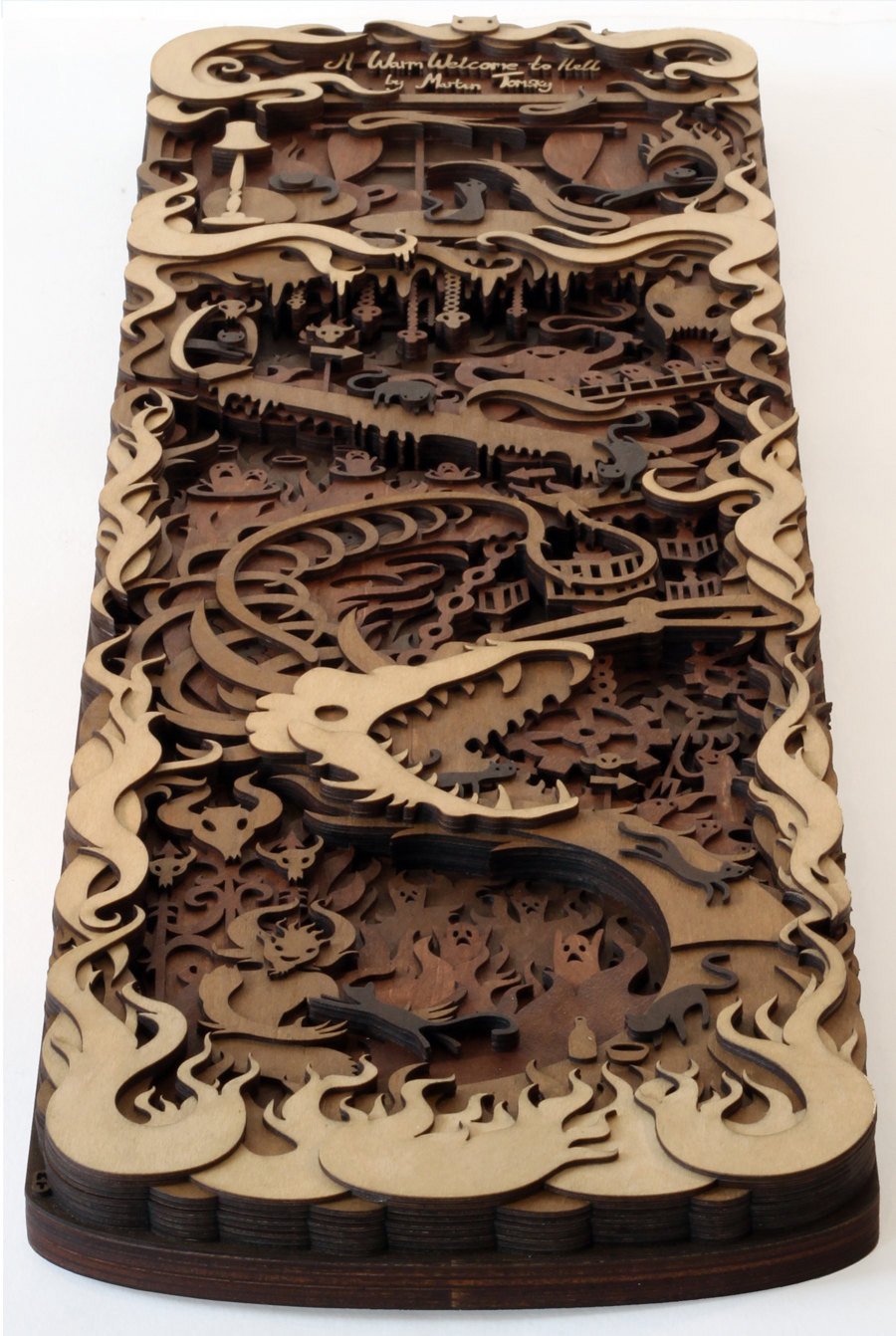Multi-layered Laser-Cut Wood artworks by Martin Tomsky