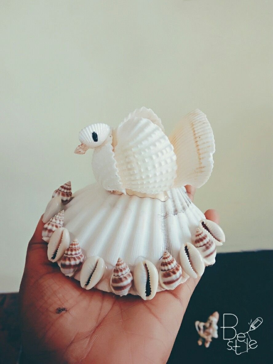Птица из ракушек