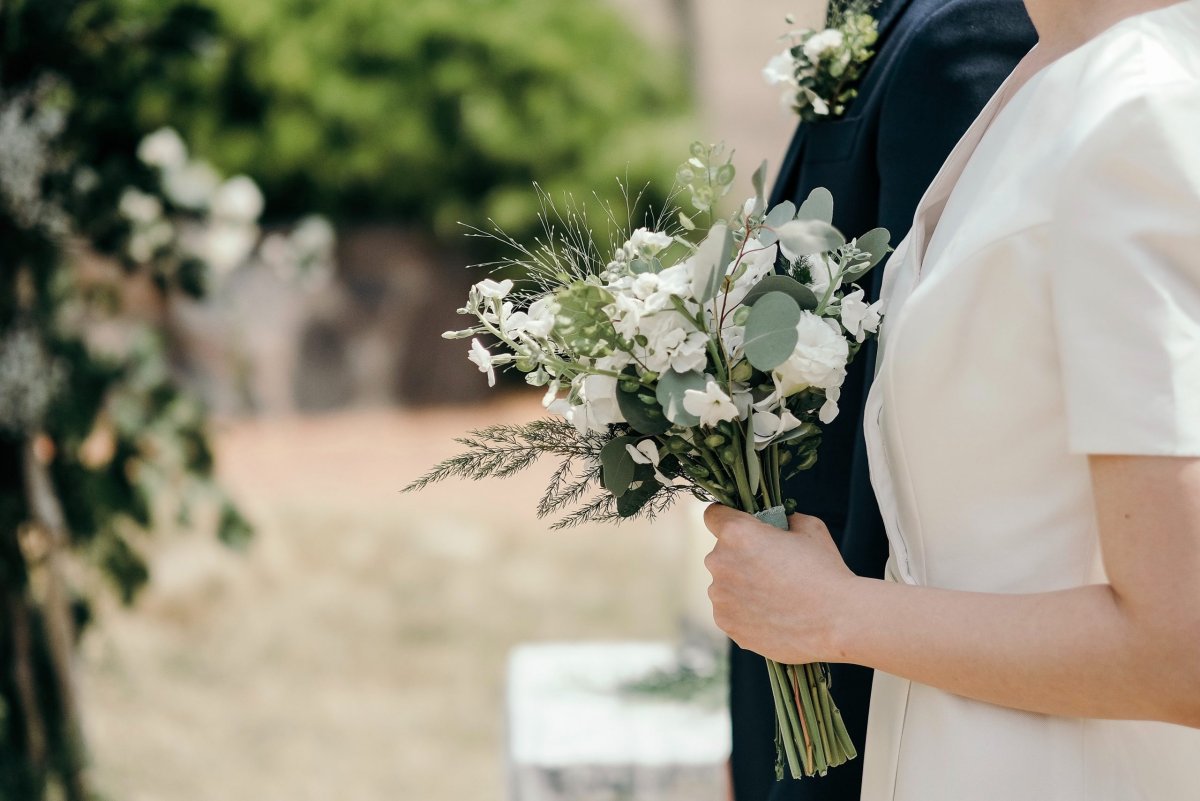 Person holding Flowers