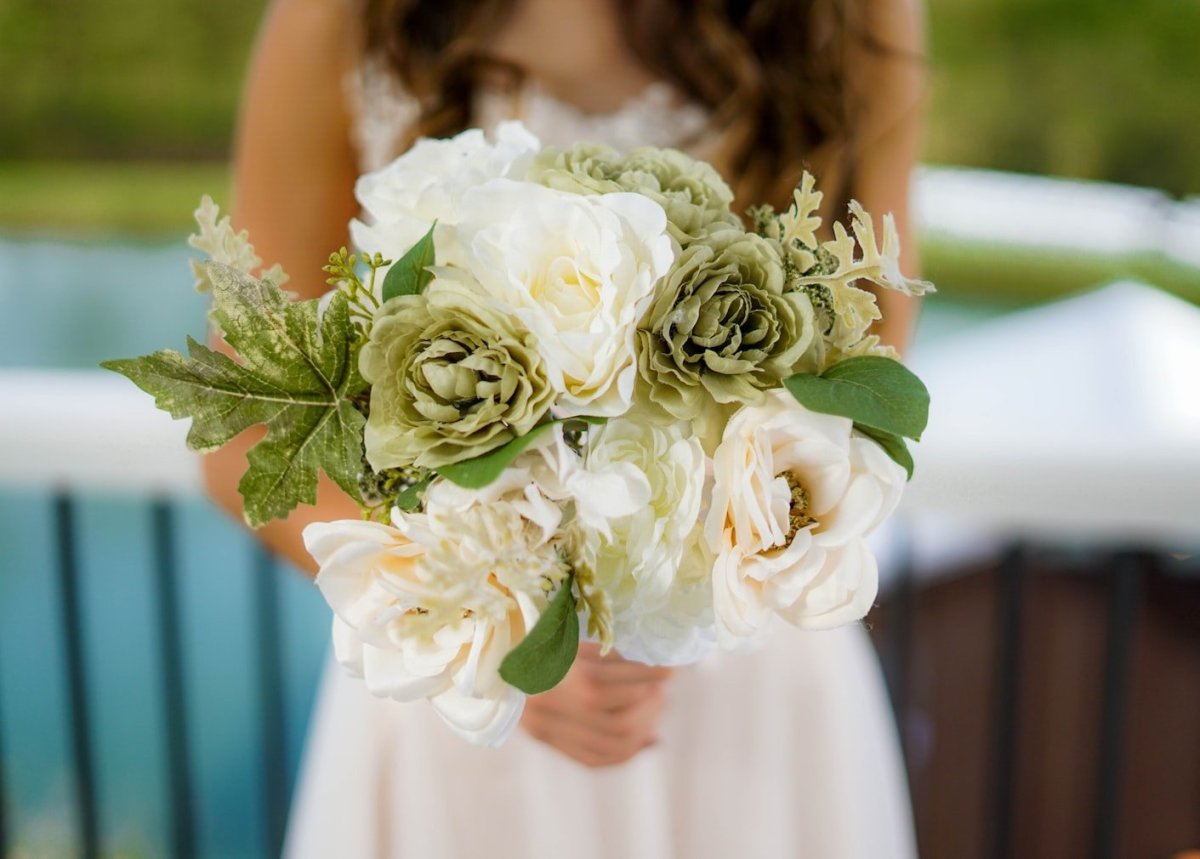 Holding Bouquet of Flowers (White)